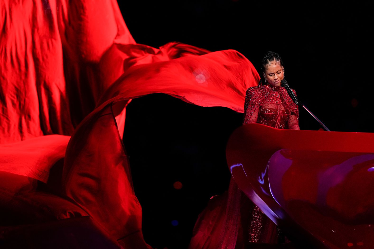 Alicia Keys plays the piano during the Super Bowl halftime show on Sunday, February 11. The show was headlined by Usher, but he was joined by several guests that included Keys, H.E.R., Lil Jon and Ludacris.