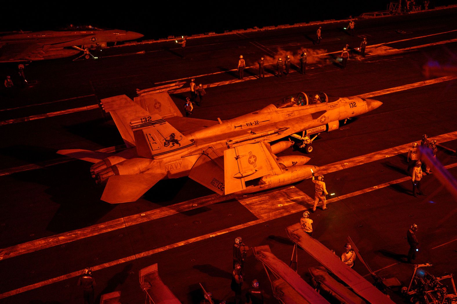 A fighter jet prepares to take off from the USS Dwight D. Eisenhower as it is deployed in the Red Sea on Monday, February 12. The aircraft carrier and the USS Gravely, a US Navy destroyer, are spearheading the US response to Houthi attacks in the region.