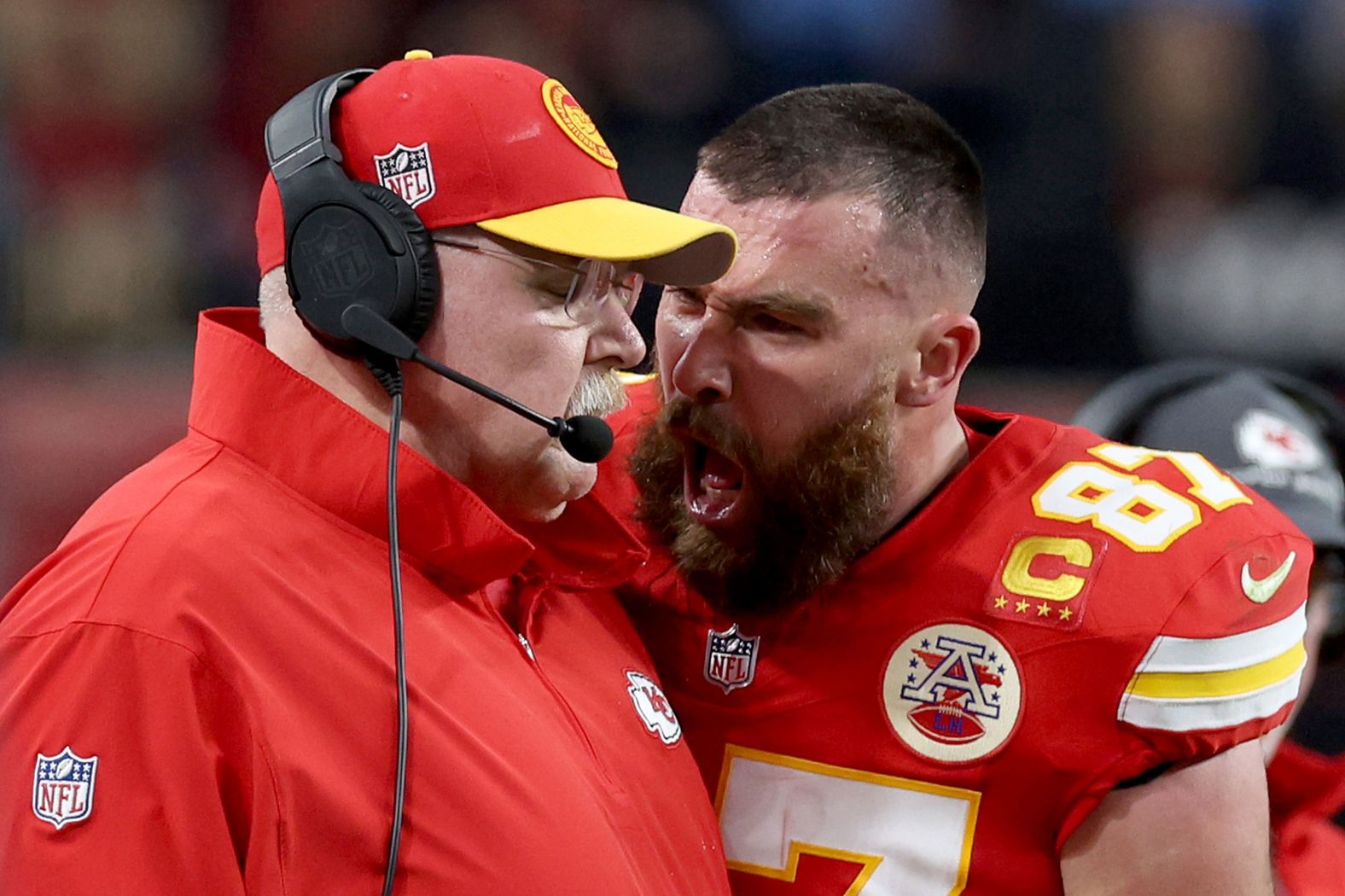 Kansas City Chiefs tight end Travis Kelce yells at head coach Andy Reid after a first-half play in Super Bowl LVIII on Sunday, February 11. Kelce also bumped into Reid, knocking him a little off balance. Reid laughed off the incident after the game, which the Chiefs won 25-22 in overtime. But Kelce said on his podcast this week that he went too far and it was "definitely unacceptable."