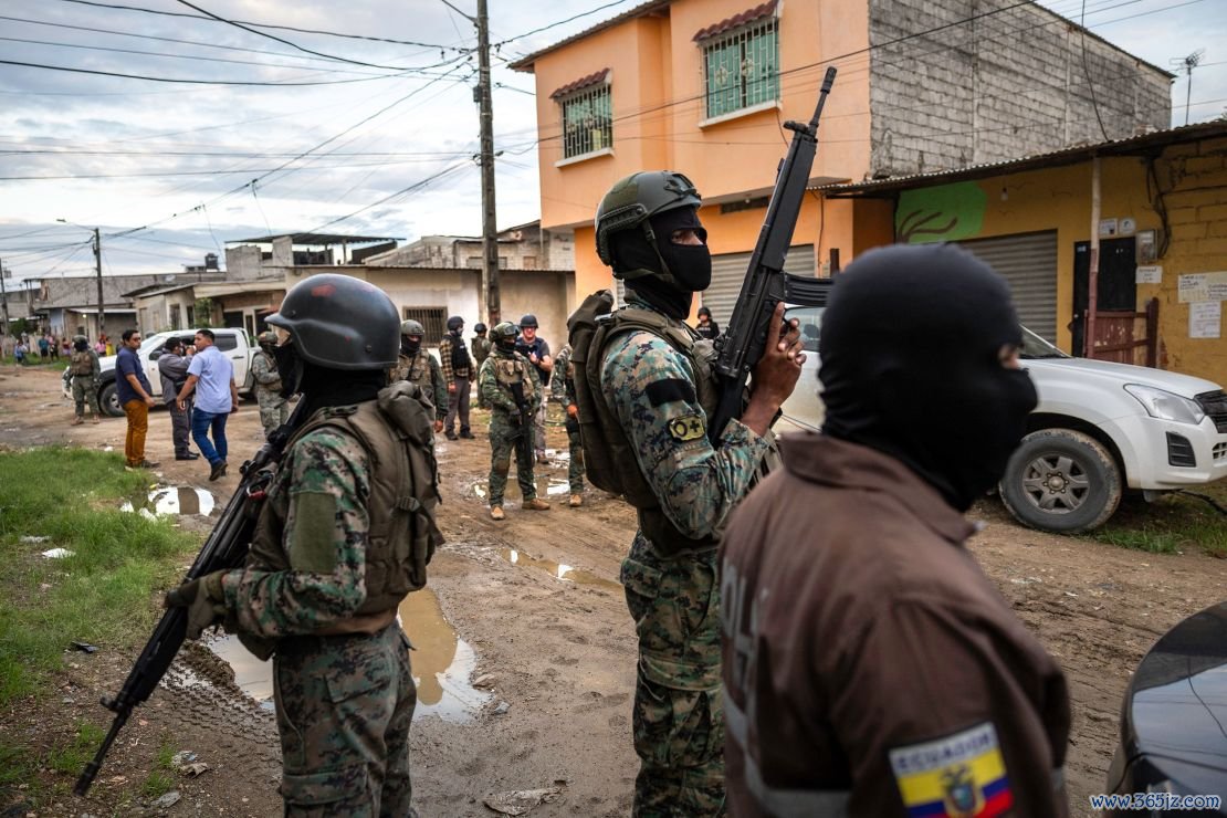 Ecuadorian soldiers search a neighborhood for illegal weapons during an anti-gang operation in Guayaquil on February 5.